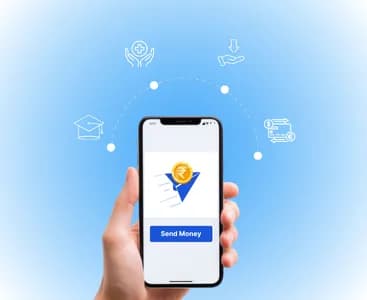 Hand holding mobile phone with money transfer app